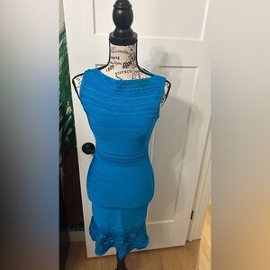 Herve Leger Vibrant Blue Bandage Dress there is a stain on the upper neck area.